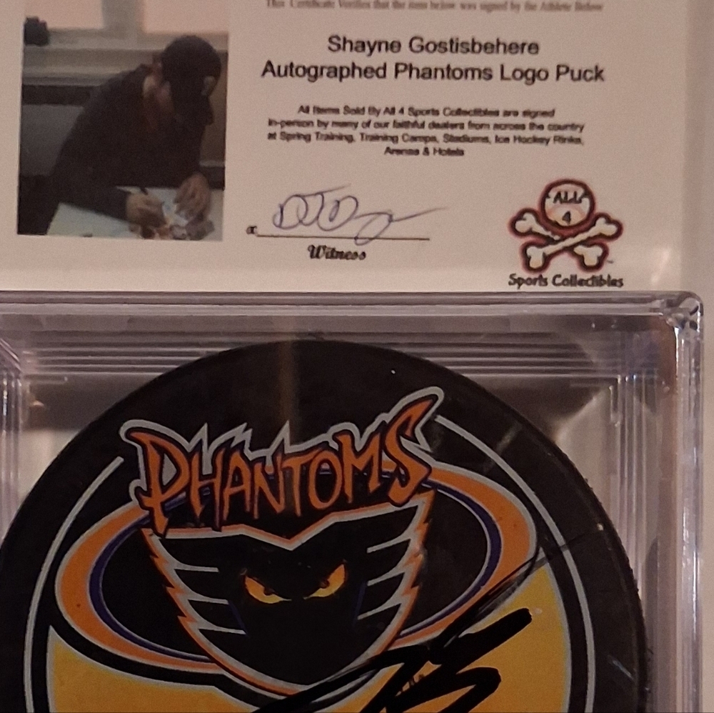 Shayne Gostisbehere Phantoms Autographed AHL Hockey Puck - Black & Yellow